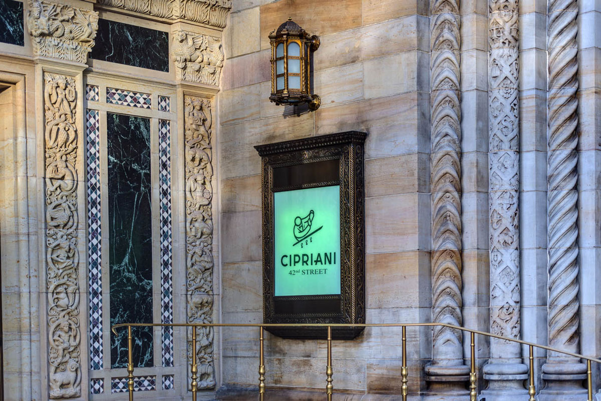 Exterior polished bronze railing outside Cipriani Restaurant in New York City