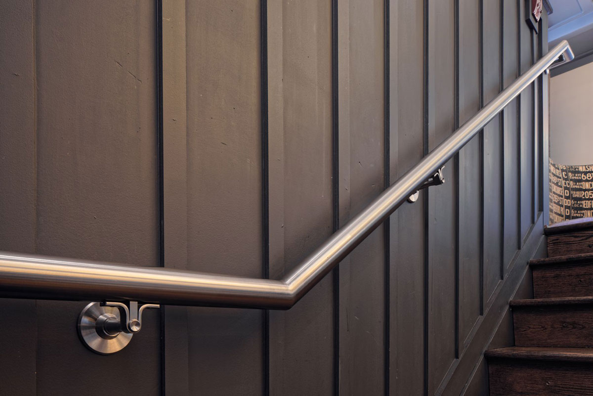 Interior stainless steel handrail and Carlstadt self aligning wall brackets
